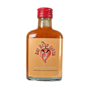 Mango Magic de Hot Head Salsa es una salsa picante fermentada elaborada con habaneros rojos y mango. Es una combinación perfecta de calor y dulzura, ideal para aquellos que disfrutan de la comida picante.